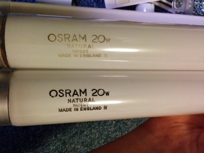 Genuine vs fake osram natural 20w
This is the lamp I copied. I did it by taking a picture from a long distance with the lens zoomed right in to reduce the curve effect, then I removed the text in Photoshop. I then printed it mirrored onto the wax paper you find on the back of labels with a laser printer (only works with laser printers). I then pressed it onto the tube with a soldering iron and removed the paper. Finally I blowtorched the print until it 'wet' and bound strongly to the glass. It's very tough after this to remove again.
