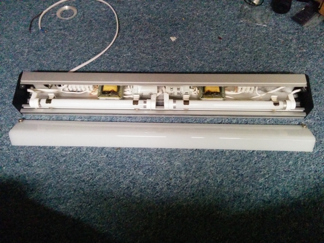 Westair 2x6w military spec fluorescent light
Possibly the most well made fitting I've ever held, I would feel confident using this as a shelf too. Runs at 115v 60hz. I have rewired both circuits in series (very easy) so I can run it on standard mains.
