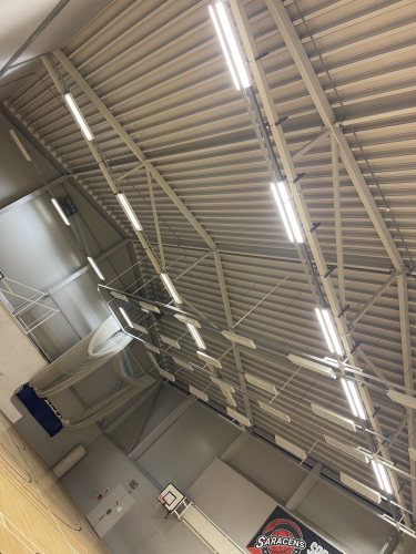 Sports hall lamp up.
Relamped this sports hall although my phone doesn’t pick up just how many fittings were out and how dim it was before I serviced the lights - all new emergency batteries and Philips 80W T5 / 830 tubes got it looking good! 
