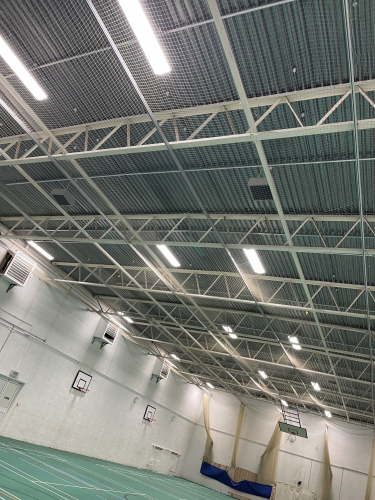 Redruth School LED low bays REPAIRED 
All sorts of questions about these lights lol the schools “other” electrical contractor quoted to do these lights at a cost tens of 1000 more than we quoted to “repair” the existing. 
I got asked some interesting questions before this job was given to us…. Will the colour be the same…. Will they be the same brightness….will they all look the same…. Are you sure the emergencies will work…. 
The other contractor it seems told the school these were impossible to repair and needed to all be replaced. 
Sadly I was one driver short as we didn’t realise throughout the day 3 of them go off and don’t come back on until the next day lol.
