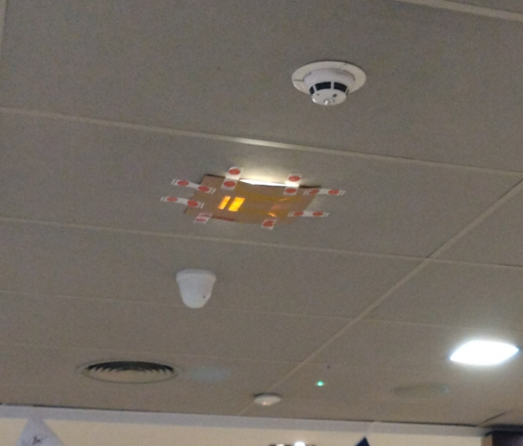 One way to deal with an annoying, flickering LED
In McDonald's. Stick some card over it and hold it in place with McDonald's stickers
