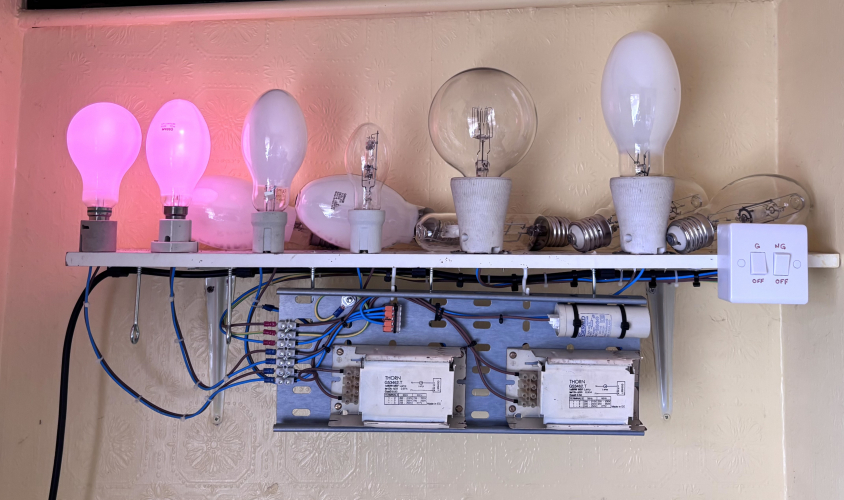 Twin MBF 80s
Two different lamps, years apart but similar in start up, but the old Philip HPL on the left loses its pink first as it warms 
