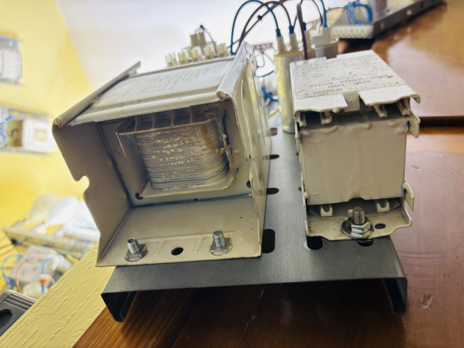 End profile of 100 watt halide ballasts 
Beta5 is indeed right, most of these Thorn/Atlas ballasts are open spaces!, the GF range are like just a laminated core with two plates welded to them.
