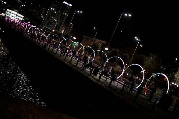Lighting Art: RGB Rings 1
I've been going through some of the photo's that I've taken of the various lighting art installations that pop up around Liverpool City Centre now and again.
It's quite hard to take a decent photograph as these installations are animated like cycling through various colours, effects and patterns ect. 
It looks really impressive in the flesh but not so good as a static photo. I've decided to upload a few which gives you a general idea.

This one was quite a lot of steel rings arranged into a large tunnel which cycles through various colours and patterns which included chasing effects, strobing, pulsating and slow RGB fades ect.
Looked quite cool tbh.
