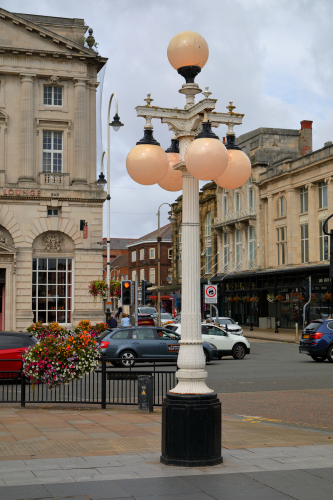 Vintage columns & globes
Quite a few of these nice looking columns around the war memorial in Southport, UK.
Either mounted singly or in multiples such as the one pictured here.

Globes look modern though with quite an interesting LED visible through the plastic! 
