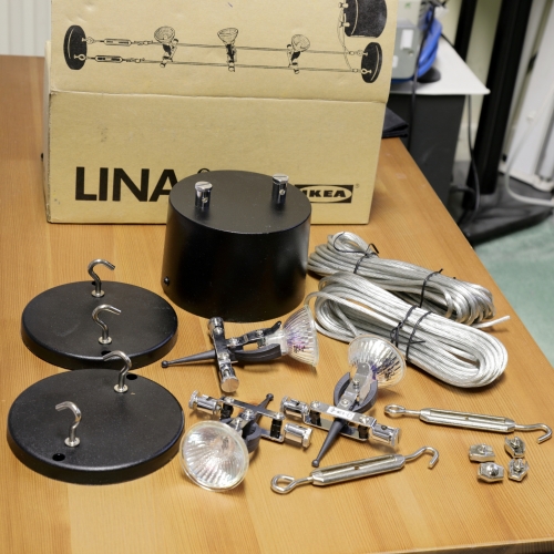 IKEA "LINA" Catenary wire halogen kit.
I got this years ago just because I could. Never really had anywhere to install it.
Has a very nice big chunky transformer that puts out enough current for 3 x 20w MR16 lamps.

