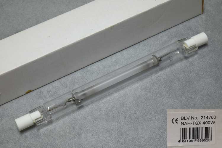 400w BLV NAH-TSX "SON-L"
1 x 400w BLV double ended high pressure sodium lamp.

Interestingly, this lamp has R12.5s caps on it which seems to make it compatible with G.E.C's SON-L series of lamps.

The Osram-GEC SON-L range was introduced in 1974 and was the first double ended high pressure sodium lamp brought to market.
They employed a thin quartz outer envelope which would not melt when brought so close to the arc tube which enabled these lamps to be positioned right in the focal point of a compact reflector system for excellent optical control.

Other companies soon introduced their own versions with Thorn quickly becoming the market leader with the R7s capped SON-TD range.
Osram also introduced a range with Fc2 caps.
SON-L was discontinued in 1994 so it's interesting to see a BLV branded one. There must have been some demand for some time for another company to deep it worthwhile to produce them.
