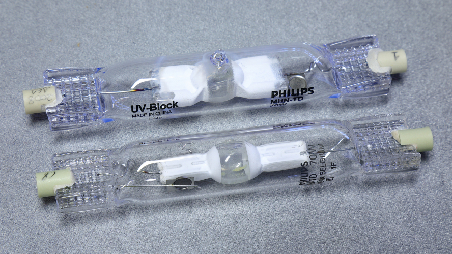 70w Philips MHN-TD: China vs Belgium 
Comparing two 70w Philips MHN-TD lamps from different eras.

Top is a Chinese model with a date code of M3 and the bottom is a Belgian example with a code of 1F.

Some substantial differences going on, the most obvious being the shape of the arc tube!
