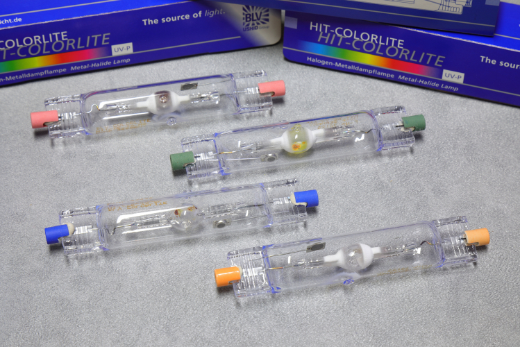 70w BLV HIT-DE COLORLITE
70w BLV doubled-ended coloured quartz metal halide lamps in Magenta, Green, Blue & Orange.

The Magenta is more of a pink to be honest and the others are quite light shades of their respective colours. Orange is more of a peach as there is quite a bit of red content in it.
Saturation levels are 18% for magenta, 35% for green, 60% for blue and 51% for orange.

Interesting to note that the 150w versions have far high saturation levels.

Like with all BLV doubled ended halides in my collection, the caps seem to be incredibly fragile. 
