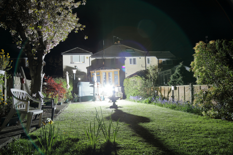 2000w halide in the garden xD
What happens when you fire up a 2kW Iwasaki EYE metal halide lamp in your back garden? 
It's bright!
