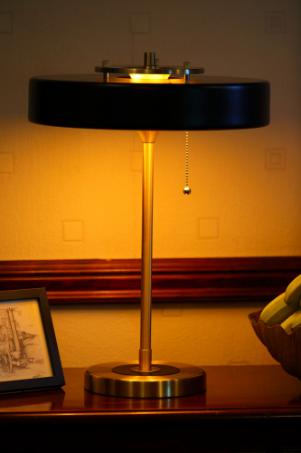 Rogano Table Lamp: 1800k
My latest impulse purchase, a Rogano Table Lamp for 3 x G9 halogen lamps.

The story behind this purchase was the excellent sci-fi series, The Expanse. (Well worth a watch, if you haven't already!)
In some scenes showing the office of the UN Secretary General, several of these table lamps can be seen dotted around.
I really liked the design and always fancied getting one. I recently found one that looks extremely similar, if not the same so it was duly ordered.
The lamp is quite good quality with a solid base, decent brass fittings and a nice metal shade. Designed in the UK allegedly.

I have since added an in-line dimmer switch to take advantage of the Osram Glow-Dim LED retrofit lamps (which are actually quite good) that I have fitted which change their CCT when dimmed and is shown with them dimmed down to 1800k.
