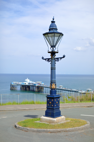 Vintage Sugg Westminster (2026)
Ex-gas Sugg Westminster that dates from the 1890's located along Alex Munro Way in Llandudno, Wales.
This is one *BIG* lantern!

The last time I checked up on this was back in 2014, it was burning a 150w SON-E lamp and it was missing all of it's glazing.
[url]http://80.229.24.59:9232/gallery/displayimage.php?pid=5435[/url]

It appears since then it has now been fitted with an LED geartray and has also been fitted with replacement glazing.
The glass has the Sugg branding on it so it might have even went back to the factory for a full refurbish where the new LED module was fitted.
