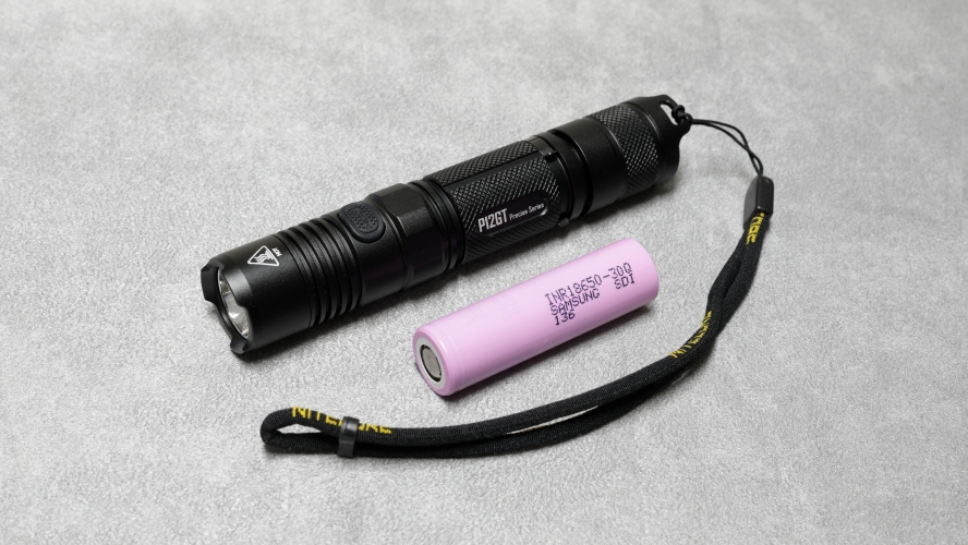 Nitecore P12GT
1 x Nitecore P12GT LED torch for 1 x 18650 lithium or 2 x CR123 cells.
Seriously bright little torch with 1000lm 25700cd maximum output and it has quite a long throw!
Has a Cree XP-L HI V3 LED unit and I'd say colour was about 5000k.

Ultra-low: 1lm 520h
Low: 55lm 28h
Medium: 280lm 5h15m
High: 1000lm 1h

A recent purchase and if you'll believe me, the delivery driver wanted to see photo ID with DOB before handing it over.
It is mega bright on high and gets quite warm!
It also has S.O.S and strobe functions.
If you press the mode button with the tailcap switch, the LED behind the mode button flashes the battery voltage and it also flashes when the battery level is below 50%.
I'll have to get a better 18650 cell for it I think.
