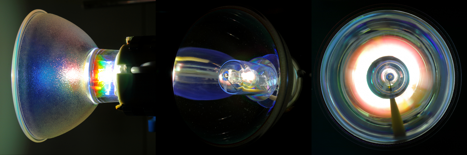 BLV 150w MHR 150 N/B FibreOptic: Full Power
1 x BLV 150w quartz metal halide dichroic reflector lamp for use in fibre optical systems at full power.
The focal distance is 61mm and the full frontal shot is further away than that, hence why the arc does not fill the reflector.
The shadow from the conductor going to the end of the lamp is quite noticeable. I wonder what effect this would have in the fire optic system.
Would be interesting to compare this with Osram's HQI-R which uses their transverse arc lamp but the chances of me ever finding one of those is practically nil!
