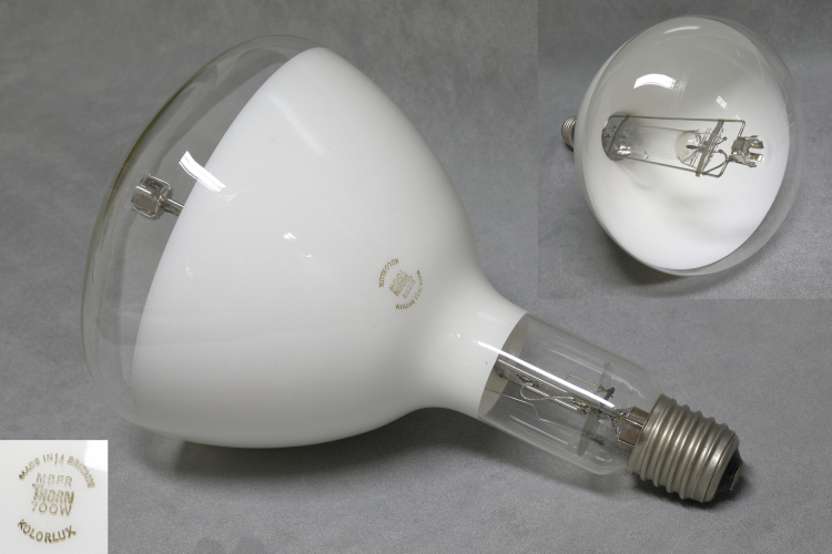 700w Thorn Kolorlux MBF-R
1 x Thorn Kolorlux 700w mercury fluorescent lamp with an internal coating of Yttrium Vanadate phosphor as well as a layer of Titanium Dioxide which acts as a reflector and directs most of the light out of the front of the lamp but allows some to exit from the rear.
