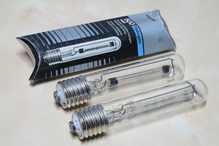 Philips 500w IODE
Mains voltage double envelope tungsten-halogen lamp.
Top one is 125-130v version and bottom one is 240v version.

Specs for 240v:
2900k
10250lm
2000h
2.17a
