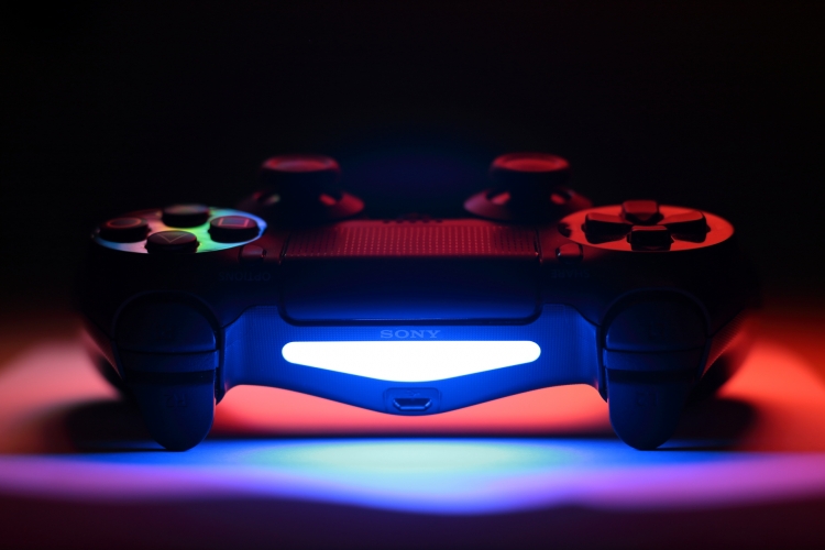 A good use for LED...
The top of the gamepad features a light bar with three LEDs that illuminate in different colours, which can be used to identify players by matching the colours of the characters they are controlling in a game, or to provide enhanced feedback or immersion by changing patterns or colors in reaction to gameplay.
 It is also used in conjunction with the PlayStation Camera to judge the positions and movements of multiple players. The light bar was developed for Project Morpheus.
