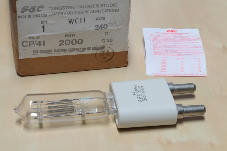 G.E.C 2000w CP/41 
New-old-stock G.E.C 2kW CP41 single-ended tungsten halogen lamp for studio work.
Rated for 3200k film stock.
8.3 amps
54,000 lumens
400 hours



