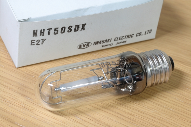50w Iwasaki NHT-SDX White SON
Very interesting white SON lamp. Looks very strange seeing a lamp this short with an E27 cap on it.
It want's 1.32 amps at 45 volts so I'll have to rig something up to run it. 
Very well made lamp!

2,500lm
6,000h
2500k
CRI 82%
