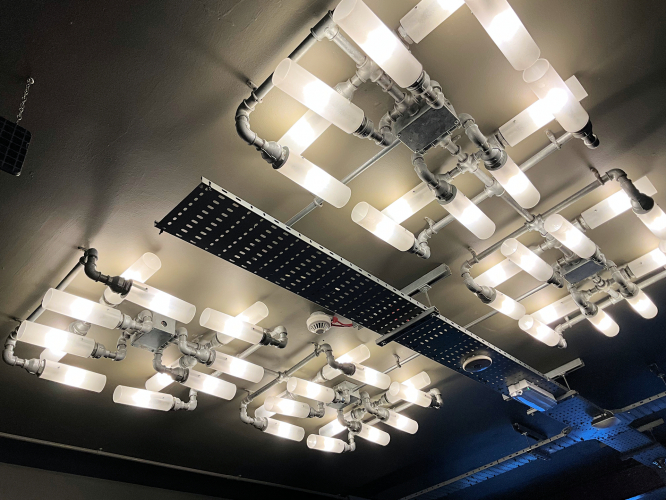 Industrial style lighting "chandelier" 
I spotted this interesting looking lighting installation in The Queens Picture House, which is a Wetherspoon's pub in Crosby, UK.
It seems to be made from quite a lot of gas piping and it looks really interesting tbh!
The lamps are E17 LED filament units.

A bit of trivia. Both Joseph Bruce Ismay and Captain Edward Smith, who are quite famous for a tragic event in history had houses nearby! 
