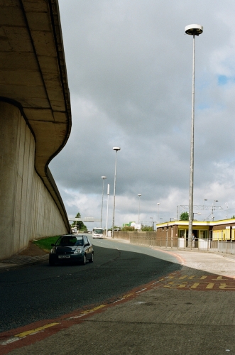 CU Phosco P213 High-mast lanterns.
Several CU Phosco P213 High-mast lanterns located near Broad Green railway station in Liverpool.
 The lanterns are illuminating the end of the M62 motorway (the flyover on the left) and the surrounding junctions from Edge lane and Queens Drive.

This was shot with my old EOS1n film camera :)
