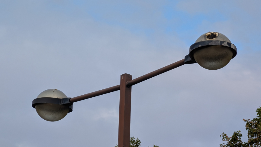Double arm spuare column
These double arm spuare columns are unqiue only to the Kingston centre, however other examples which went years ago were at a private retail park with CU Phosco P296s.

Installing these as one whole piece must have been interesting back in the day!
