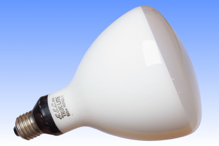 GEC Toplite MBFR 125W
GEC Mercury reflector lamp with unusual shaped bulb.  While most companies made their MBFR 125W with the ordinary parabolic shape reflector bulbs from R125 incandescent, and as a result suffered poor beam control, GEC made a unique effort to optimise the shape of the bulb around the long mercury arc tube for superior optical control.  The black painted area around the cap is another unique touch, to avoid projecting an unsightly ring of light onto the ceiling above the lamps
Keywords: GEC MBFR Mercury Reflector