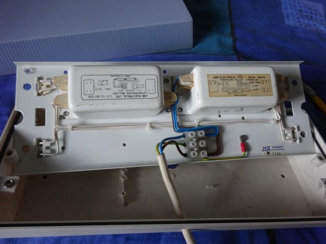 Twin 8w starter less gear layout
To the unassuming eye this is just a regular fluorescent bulkhead, however once opened and the gear tray pulled out you can see why its not. Its with huge thanks to Danny for allowing me the opportunity to finally wire in these two JSB starterless ballasts into a bulkhead where they actually fit nicely. There's ample room for a third ballast, but the likelihood of another turning up is very small, owing to the seemingly overall rarity of the ballasts.

The screws that secure the gear tray to the base and the cover screws were missing. Whilst the cover screws were simple to replace, the four for the gear tray required a small insert in the base, also missing. To get round this I simply heated some hex nuts up with the blowtorch and melted them into the plastic. They're surprisingly solid, which is good cause I can now install the bulkhead no issues.

The gear trays wiring has been done to my usual over the top OCD standards, with each wire being bent carefully so all bends are 90 degree's, and that the wires align with each other. I don't know why or where this OCD came from, its likely due to having an eye for even the smallest details that can be missed or overlooked. As expected, the ballasts start tubes exactly the same as any other quick start ballast, and even with some EOL tubes that won't strike or light on SS gear, these get them going no issues, so I think these will be brilliant for frying tubes. 
