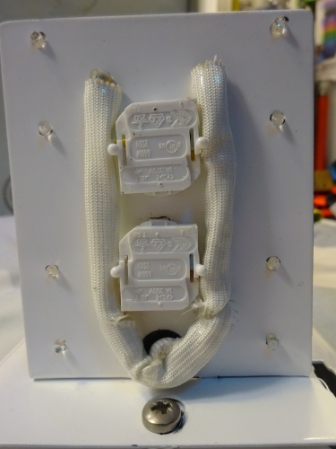 4X 6w JSB ex emergency conversion, wiring
Earlier in the year I completed a quad 8w conversion, and previous to that I also completed a twin 4w, triple 4w, twin 6w and triple 6w, so to continue that trend I thought it would be good to try and create a quad 6w conversion.

I received the (ex) emergency light required from Jon a few months ago. Originally for a single 6w tube, its a very oversized affair of a light for what it is, and having no decals on it makes it look even more of a pointless size. Despite this, it proved more than ideal to accept what I had in mind for it, and begun to measure up and create two brackets with which to mount the eight lamp holders and four starter sockets to. Once they were made, I fitted it all together to make sure it all fit properly and looked right, and then stripped the whole light down to respray it. Once it had dried enough (so I thought...) I was able to reassemble and wire up, something that took hours once again due to the complexity of the design. 

In the end wiring the bulkhead up took me about 4 hours, but when you see the end result, you'll see why, it was really difficult getting the wires to go through the brackets and also the gear tray, while also making sure its all enclosed inside the heat sleeving. Overall though I think the end result has come out very well.
