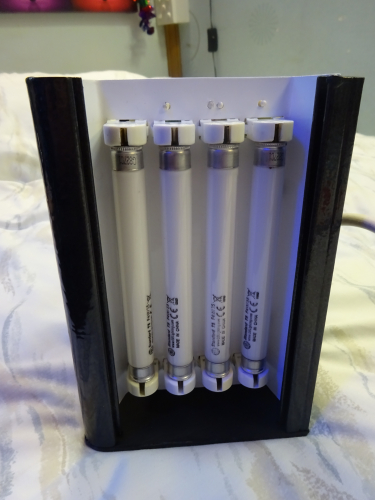 Quad 4w bulkhead build - Lamp layout
Last month, a collector gave me a 6' fluorescent shop sign light, my intentions is to use that as a light for down the side of my lanterns shed. However one thing did put me off it, the fact it was about 19cm too long. I decided to cut it off, really tidying the fitting up, but then looking at the offcut, I wondered if I could make a second light from that.

After 3 weeks, this is the result, a quad 4w fitting. I had initially debated twin 9w PL, and even 10w 2D, but the latter is too rare now, and there's plenty of 9w PL fittings around. I have quad 8w bulkheads and have built a quad 6w fitting too, but a quad 4w isn't something I had yet made, hence my decision.

To build this, I had to cut two new end pieces to fit, and also design, cut and bend a piece of metal to form a gear tray with which the four tubes will be moved away from the diffuser, whilst also giving enough room for the gear to also fit comfortably too. It's definitely one of my most tightest and compact light builds to date, but its output is really evenly spread and controlled, even going as far as making the 4 tubes look like one even area of light.

With the cover removed, the tube layout is revealed. As I was building this, I thought the tubes may end up being a bit too close together, but as can be seen there's ample room between them.

This has to be one of my most favourite creations yet, and hopefully very soon when we find the right one, its to be installed on the front of our house illuminating the number of our house, so will see plenty of good service!
