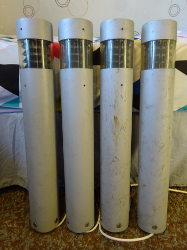 Castaldi Polo bollards.
At the start of 2025 I visited a certain reclamation yard, and as I was just wrapping up with purchases, I spotted these tucked away in a corner. Me being me, I bought them immediately, as I'd never seen bollard lights this small ever. I did notice the lamps were smashed, and some louvres were also damaged too, but I knew I could sort these minor issues.

Returning home, I got straight to cleaning the broken glass and smashed lamps out of them. I have to say these are very fiddly things to work on, you basically have to take them almost completely apart just to get to the lamps. After I cleaned them, repaired the louvres and polished the lenses I moved directly to testing them. All of them had HF ballasts that didn't work, so I decided to make them into switch start bollards. Getting the necessary components, I drilled holes to mount starter socket's, and then fitted 16w 2D ballasts, the best equivalent to run the 18w PL lamps. I also took the opportunity to wire them it a way where both 2 pin and 4 pin lamps can be fitted, meaning the versatility of them has doubled. I got them lit, and I have to say for being as small as they are they're impressively bright, and they light the surrounding area incredibly well! This is in part due to the fact the bottom of the louvre is white plastic, the top being black, so there's also next to no upwards lighting, a very very well thought out design.

Then Dad saw them, and to my surprise he said he really likes them and they'd look perfect on the steps outside our house, so I'm now moving into the next step of their repairs. I'm going to respray them all to satin black, I would keep them grey but I think black would better suit them. I'm also in touch with the company that made them, as these bollards are still made today (but LED only surprise surprise) with hopes of getting some brand new plastic lenses for them, owing to the fact these are yellowed, slightly cloudy and in some cases surface cracked. If I can get all this done, hopefully very soon they'll be lighting the steps on the front of our house!
