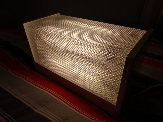 4X6w conversion gets a prismatic cover! Lit.
Back in 2024 I was given this ex-emergency light by Jonathan, which I immediately converted to quad 6w, and whilst it turned out perfectly, I still thought the opal cover made it look quite 'normal' so to speak because the tubes weren't visible.
 
I always wondered what the fitting would look like with a prismatic diffuser fitted instead, and last week I decided to attempt to create my own by ordering some plastic in, cutting it to size, and then created a very ad-hoc line bender to bend the plastic to fit.

What I've been left with is imo nothing short of a tenfold improvement to the way this fitting now looks, it looks so much more modern, and when lit from certain angles it looks like you can see five tubes. Its also remarkably brighter too, and easily lights an area to a good brightness too.
