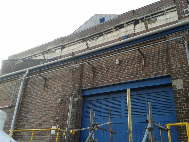 Weird Installation
On a local MOD site is this well unusual lighting installation. Over a set of roof panels on the side of a pump house is this row of Beta 2s! Not sure how much they would ever have dobe even when they were working! 
