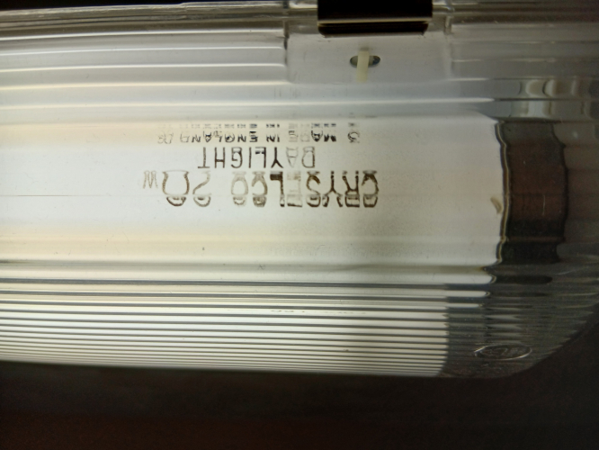 Cryselco Daylight 20w T12
2 of these spend a few hours a day lit in a Sylvania branded weatherpack in my bathroom. The fitting is rather cheap & flimsy, but has Sylvania branded electronic ballast that does not 'instant on' the tubes - more of a SRS style fade in. Tubes are most likely under run so will out last the fitting I'd guess (they were well used when I got them) 
Keywords: Cryselco Daylight 20w