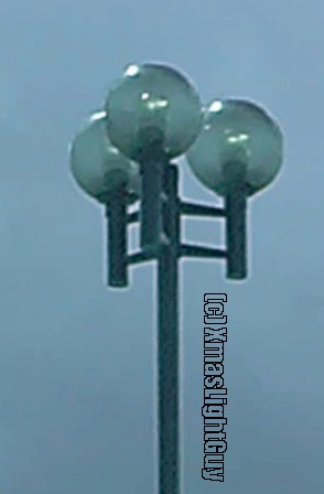 StreetLight #135
3-lantern clear-globe pole .. kinda cool looking imo.
(image quality is kinda low since it was a frame-grab from a video taken in a moving car)


Location: University Blvd, Denver Colorado
