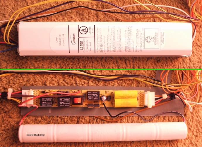 US Fluorescent Emergency Ballast  - Open To Show Insides
A LightGuard L1400 Fluorescent Emergency Ballast...
Top part shows the unit as you'd normally see.

Bottom part shows it taken apart. 

Sorry for the pink-ish color...pic was taken under Gro-Lux type lamps.
