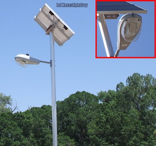 StreetLight #062
A Solar LED parking-lot light. (for a park/trail .. the lot itself is dirt/unpaved)
This is one of the uses where I would consider LED to be a good thing. (who knows on the quality though)
No idea how bright these are since I've never been there at night. Really don't need to be all that bright for where they are.

Keywords: Solar; LED; StreetLight 