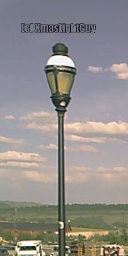 StreetLight #225
A post-top streetlight (no idea on its actual age, or make/model. probably  HPS/SON)
(pic isn't the best since its a frame-grab from video taken from a moving vehicle)


Location:
Fairplay CO
