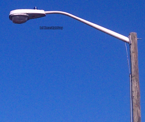 StreetLight #253
American Electric Lighting 
Model 13

-------------------------
Pic & description is from 2016:
Most of the streetlights on the streets around where this one is have been replaced with LED models...
This one is still HPS/SON, likely the only reason being because its in a park (for the parking lot) rather than on a street.
-------------------------

I'm gonna have to go find this & see if its still there, as nearly everything in that area has been LED'ed now (including the park's walkway lights)



Location:
Ketring Park, Littleton, CO
