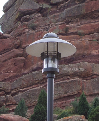 StreetLight #277
Decorative-style parking-lot/walkway light. I guess you could say mushroom shaped? or maybe UFO shaped? .lol.
I'm assuming its probably MH, but could also be SON/HPS....its deff too new to be MV.


Location:
Red Rocks Amphitheater/Park, Morrison, CO
