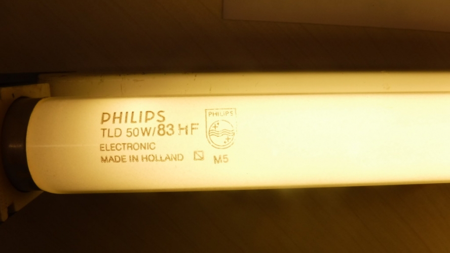 Philips 5' 50W/83 HF
Triphosphor tubes are insanely bright compared to old halophoshpate. Although intended for electronic ballasts, this is a perfect match for old 50W mains ballasts.

