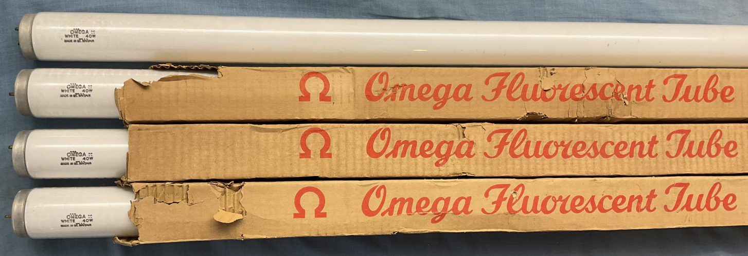 Omega 4ft 40W White T12 fluorescent tubes
Found/saved alongside a few other vintage white/warm white 5ft and 6ft T12 tubes (and a sole Thorn-Mazda 15W T8) in a small "free on collection" bundle on facebook marketplace, as they where just 20 or so miles away I thought it was more then worth the trip in the car to save em for the collection :) 

in particular I am uploading these Omega 4ft 40W White T12 fluorescent tubes from that bundle to get them uploaded before the sleeves fall apart, as the sleeves on these are very crispy for some reason and it is the sleeves why I upload these, as I could not help but think and noticed, until now I am not sure I have seen an Omega T8 or T12 tube in its sleeve before now? or seen a Omega sleeve in general like this, I have seen a fair few Omega tubes show up here on LR etc, but none ever with their sleeves I dont think!

so even tho the tubes are not all that special in the grand scheme of things they are not a fancy colour or weird design or anything like that (tho still nice vintage T12 tubes which are always nice) I thought it was worth an upload to document the Omega sleeve design etc :)
