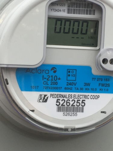 My first Kilowatt-hour clocked on the meter
Day 2 of my service i just clocked my First KWH
On 120 volt On I-210â€™Aclera electric Utilty meter 
From Pedernales Electric coopertive . It a reporting
Electric meter as my electric company were one of first
To use such meters as it was hybred rotating while type
With a hole drilled using a pulse counter to report wirless back to central 
Office. But mine all digital meter. Well time to install my personal electric meter
