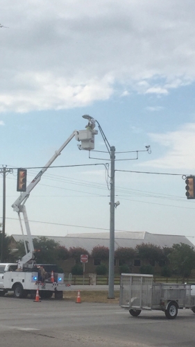 A contractor Reballasted a Texas Street fitting
A contractor at intersection reballast a Cooper OVW Son street fitting
This type of street lights is only found in Texas.  basically it a full cut off 
Of westinghouse OV25 with cooper reflector.  Good see them going
But it still endanger to future LED conversion. 
