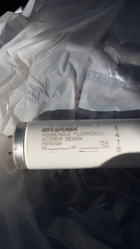 Sylvania 14 watt Design 30
Here a interesting one

It a F14T12/D30. It basically a warm white deluxe lamp
Also this was in transistion phase after Osram bought GTE Sylvania out.  Last style of that year and month etch. 
