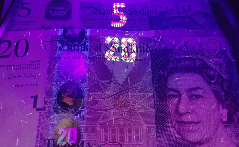 UK Bank Notes Under Blacklight Blue

I've never seen a UK bank note under UV before. Here's what they look like...
