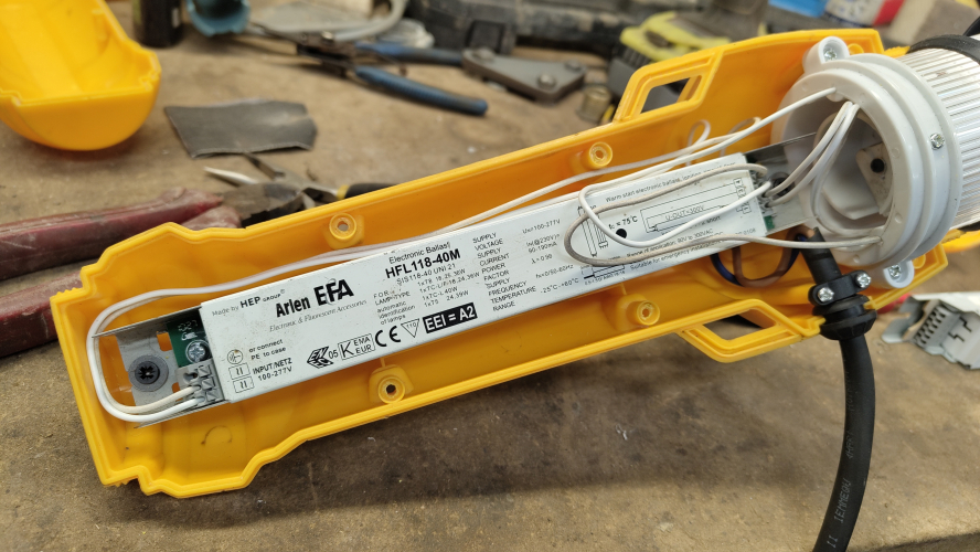 Retro-fitted Control gear in a crappy Defender work light

Here you see inside the control gear compartment of a slightly crappy Defender branded work light that recently turned up in the weeeeeeeeeeee skip. It came with a non-working LED tube fitted (OEM) and this comartment just empy. I initially replaced the LED tube but found light output dissapointing.

As you can see here, inside it still has all the mounting tabs for a HF ballast & holes for extra lamp cables etc so naturally that's what I've now fitted along with a proper T8 840 tube and now it's much brighter!
