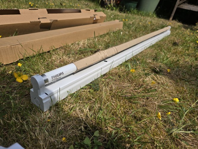 Tamlite 58W electronic ballasted fluorescent fixture 
I got 2 of these BNIB at the car boot sale today. It is that 'decent design' one that Ring Lighting has used and whilst I have the switchstart version of these under the name of Ring, these 2 I got today are the electronic ballasted version (HF) 

Both came with Philips TLD 840 tubes that are modern Polish made 
