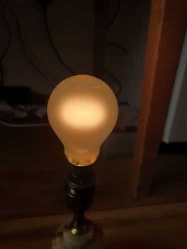 Philips 40W GLS incandescent bulb made at the start of the 90s lit up
Here it is lit up
