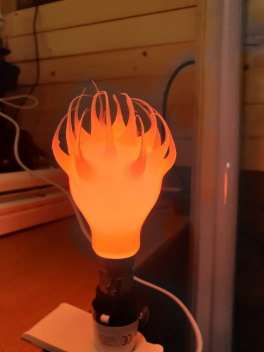 Alpha branded spiky GLS incandescent bulb 
Got it last year 

Orange coloured 
